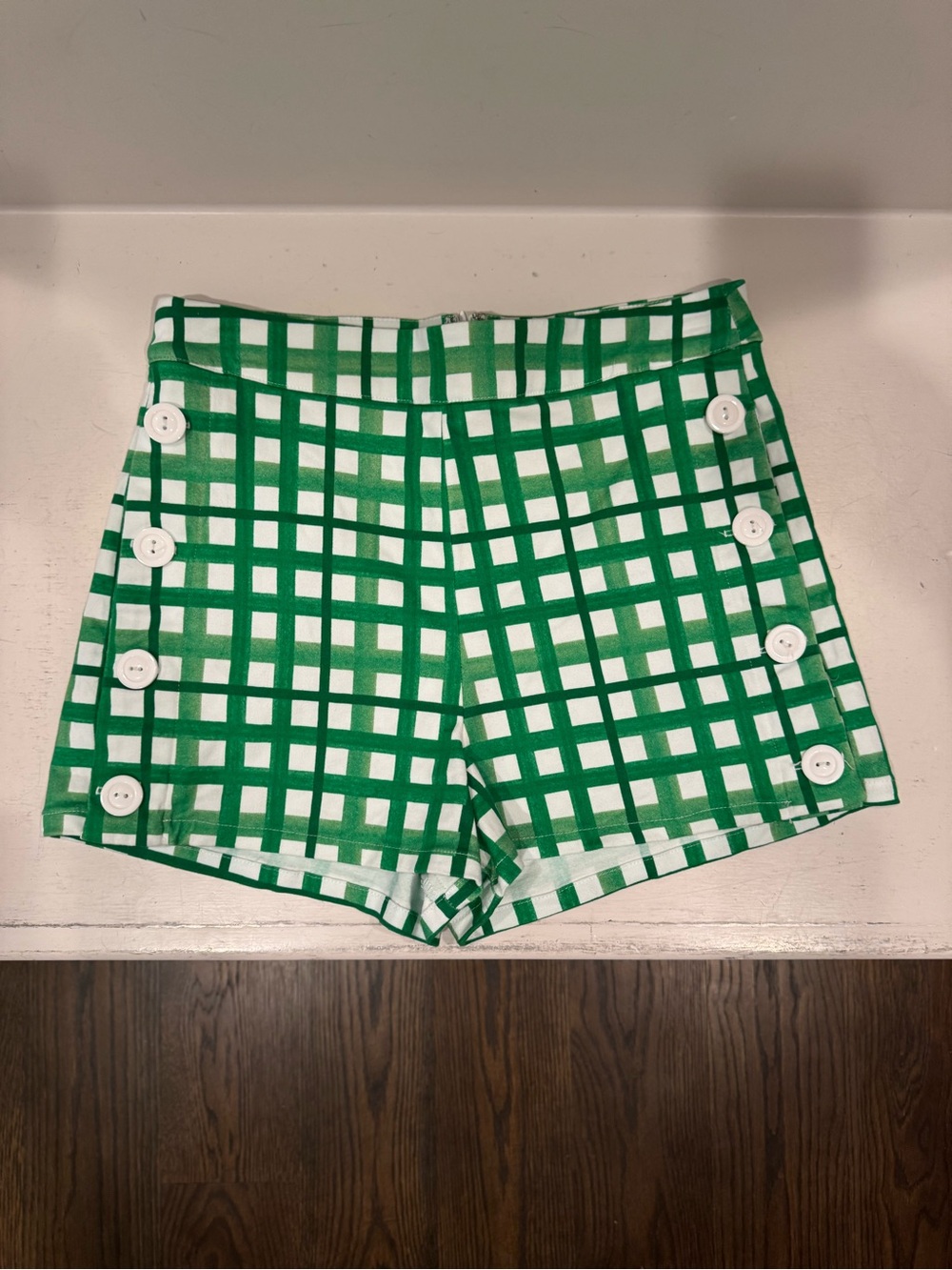 Green and white shorts